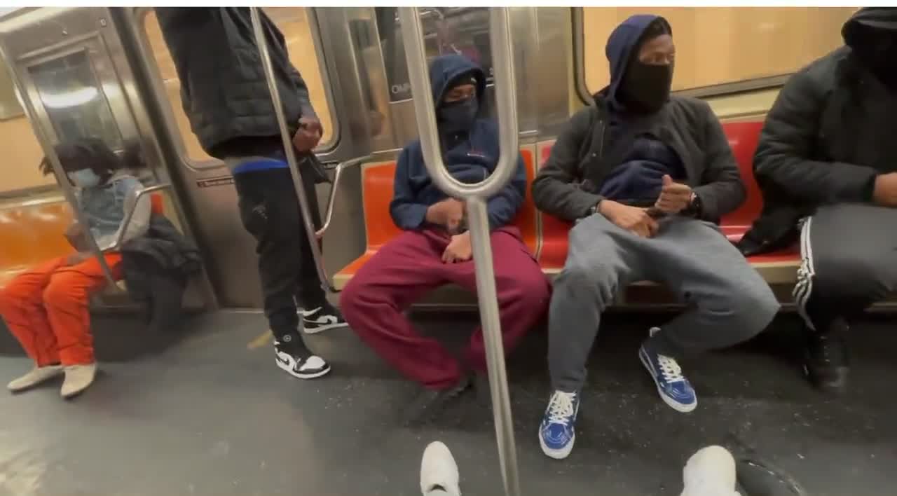 All masturbating at the same time in the subway
