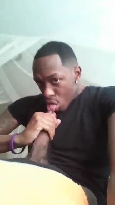 Horny nigga sucks his own huge meaty cock