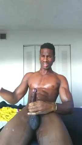 Horny nigga using his huge flesh light to masturbate