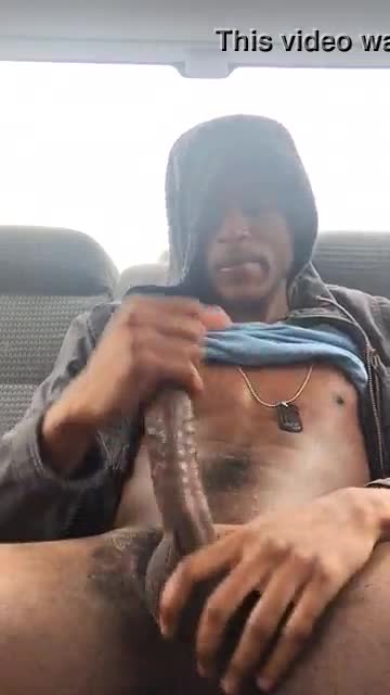 black with a hairy cock masturbates in the back seat of his car
