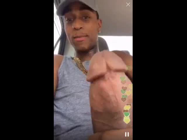 Horny black slapping his cock while he masturbates in his car