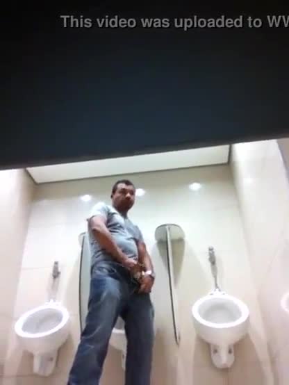 Spying in the public toilets cute and huge cocks