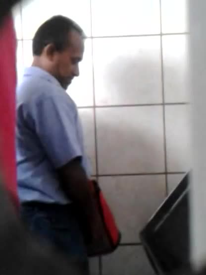 Spying on guys in public toilets