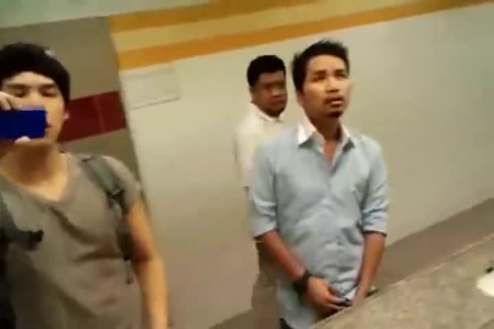 Asian guy cuming in a public bathroom