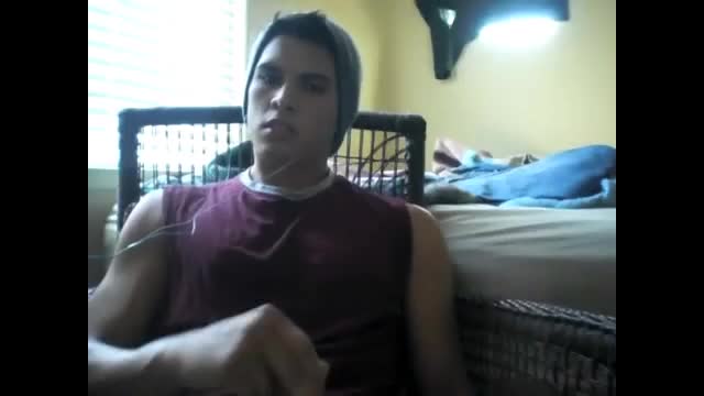 Young peruvian guy stroking his uncut cock