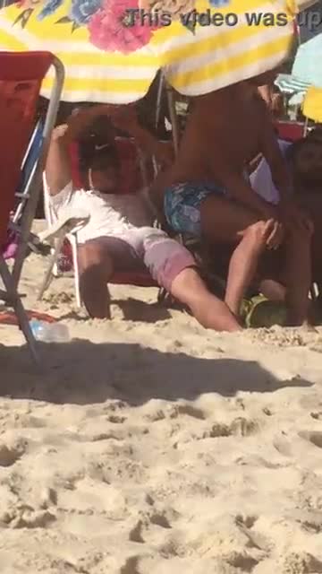 Caught a hot guy stroking his cock in public beach