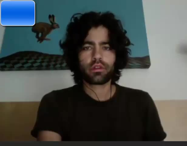 Cute bearded actor stroking his cock in front of a webcam