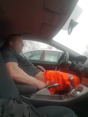 Horny muscular fireman wanking his cock before work in the car
