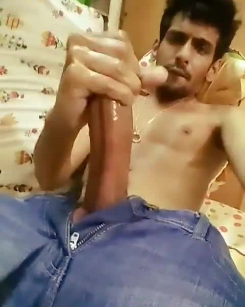 Enjoying Arab dude stroking his huge oiled cock